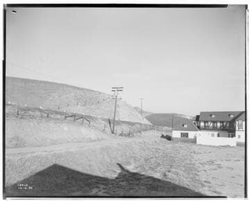 Distribution Lines - Malibu fire area, showing beach house on beach at Pacific Coast Highway