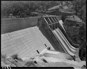 View across downstream face of Dam 7 from intake tunnel side, probably during the dedication of Redinger Lake and Big Creek 4 project