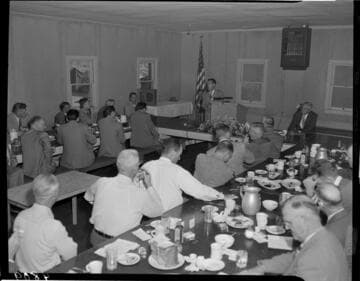 Luncheon with man speaking at podium
