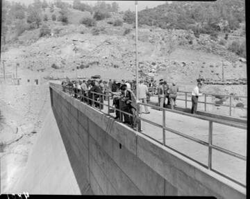 Crowd of people on the crest of Dam 7 touring the dam probably during the dedication of the Big Creek 4 project