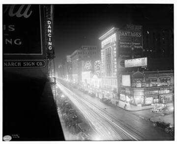 Night photo from 6th Street looking north on Broadway