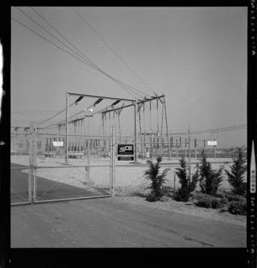 Hinson Substation, woman using an SCE (dial) phone, woman holding certificates for Electric Living Center course, elevator operator at Edison General Office and two linemen in the field