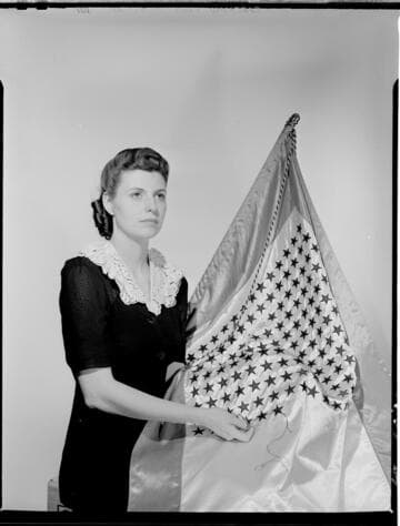 La Nelle Smith with service flag for Electrical Times cover