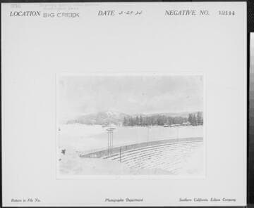 Big Creek Huntington Lake Dams - Huntington Lake - View lookin east with downstream side of Dam #3 in foreground, and part of upstream side of Dam 2 at left center, during winter of 1923
