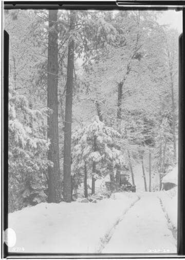Model T truck on snow covered road near Powerhouse #1