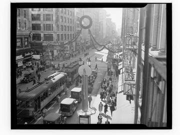 View down Broadway, downtown Los Angeles, with streetcars and Christmas decorations