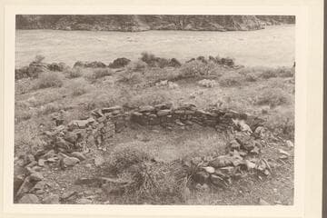 Ruin on bench below Bass Cable; right bank.  Preliminary gauge:  108,500 cfs