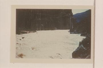 Inboard motorboat clearing the point below Vulcan Rapid