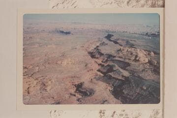 Down Cha Canyon.  The Henry Mountains on the skyline