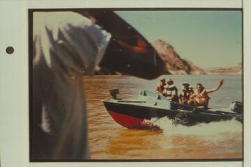 The "Bootoo" on Lake Mead at the foot of Iceberg Canyon.  Buzz Belknap at the controls