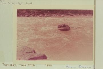 Bill Davis in his 7-man inflated boat pulling out below Disaster Rapid.  Photo from right bank