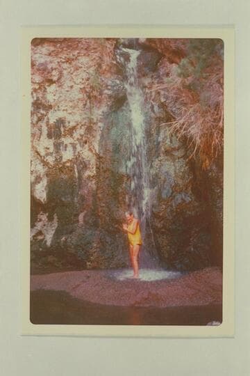 Hot spring in Black Canyon two miles below Hoover Dam.  Jorgen Visbak enjoys a shower