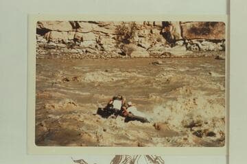 George Stewart's 10-man sliding into hole in Coat Creek Rapid due to being off course to the right about 10-15 ft