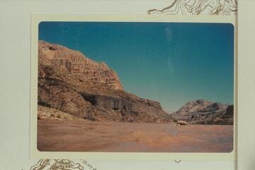 Up river from Mile 222.5 showing lava remnant on right bank