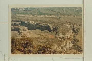 Steamboat Rock at left from Harpers Corner.  Pool Creek is right and Sand Canyon upper