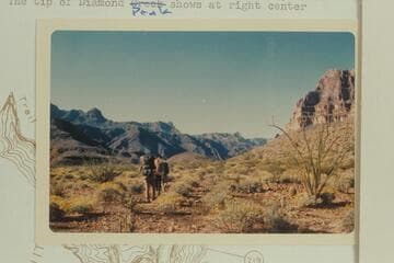 Down at right bank at Mile 220.1.  The tip of Diamond Peak shows at right center