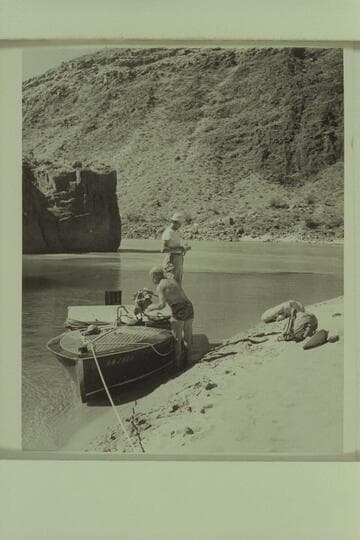 The motor boat moored in the lagoon at Tapeats Creek; Guy Forcier and Marston