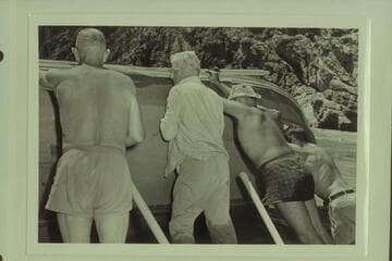 The CACTUS is rolled up for repairs below Tuna Creek Rapid in the Grand Canyon