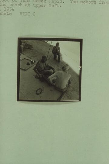 Cutler photographing Sanderson and Desloge at the radio at the foot of Tuna Creek Rapid