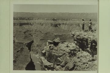 Maradel and Margaret Marston looking down into Marble Canyon from near the top of the cable.  The motorboat crew are camped below on the right bank of the river near Mile 41