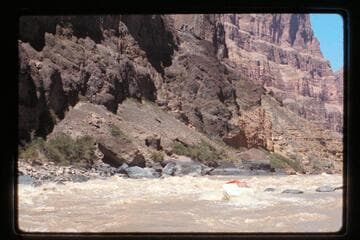 "Wee Red" tries to climb Vulcan Rapids