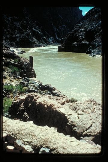 Four boats coming down river above Bright Angel Creek