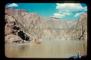 Camera boat at suspension bridge