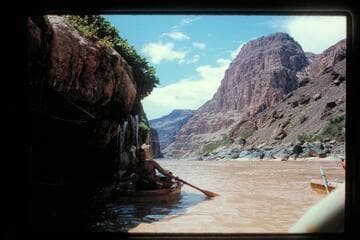 Buzz showers in springs at foot of Vulcan Rapids