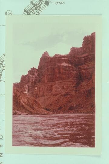 Down from the foot of Rapid No. 22 at Mile 202.30 to head of No. 23 which is Mile 202.20.  Taken from the river