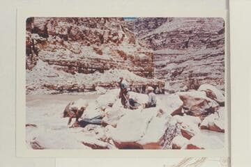 Lining 10-man neoprene inflated craft at Bowdie Rapid