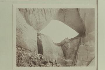 Window in Davis Gulch; measured at 135 feet wide and 85 feet high.  Marston appears center below the arch