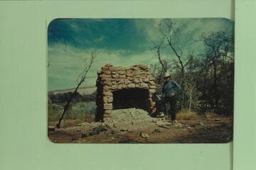 Old fireplace at Camp Stone.  Ynez Haase stand near