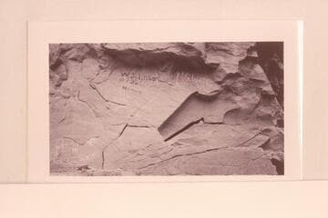 Painted inscriptions at Mile 182 1/2 below Dark Canyon.  Note Hervig name