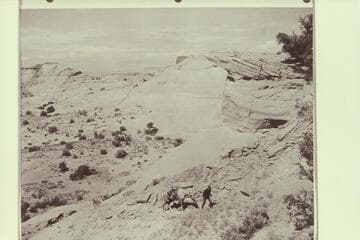 Going up the steep slickrock to the bench in fron of Arch in the Sky