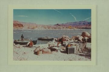 Enacting a camp scene in "The Colorado River Story," Idas Riffle.  The clouds are not vapor trails
