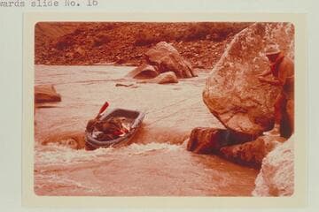 Bill Belknap lining a Sportyak at Mile 204.50--head of Rapid No. 16 in One Mile Rapid as shown on LaRue photo #95 of 1921, Sep. 17