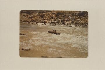 5th Rapid, Mile 210.5.  Frank McKeown and George Simmons riding the "Jeff Davis"