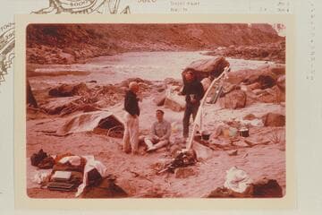 Dock Marston, Buzz and Bill Belknap.  Camp at Mile 209.6 RB between Rapids #6 and #7.  The head of Rapid #7 is in the background