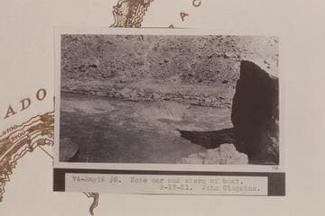 Oar and stern of U. S. Geological Survey skiff in Rapid #5