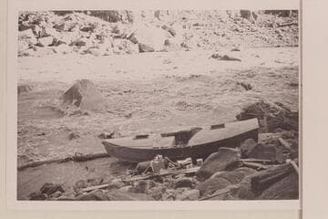 Holmstrom portage at the rapid in Cataract Canyon which he numbered 16.  Between Miles 202 and 203.  October 29 or 30.  Approximate gauge:  6,100 cfs