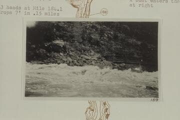 Rapid No. 43.  A boat enter the rapid at right