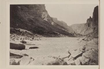 Ellsworth Kolb running rapid in Cataract Canyon.  Lint album