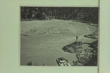 Cobblestone island which may be the one below Disaster Falls on which the crew of the Powell boat, "NO-NAME", landed after smashing in the falls above in 1869