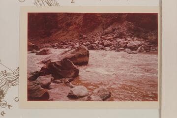 Across the head of Rapid No. 22.  Visbak capsized his Sportyak against the large boulder at left.  Similar to 3810 CTCN 7