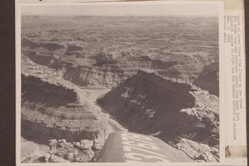 Mouth of Green River from one mile up the Green River.  The Grand (now the Colorado) enters from upper left.  Cataract Canyon is right and "The Needles Country" in distance