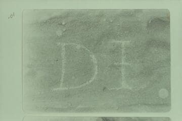 The D I 1838 inscription at Mile 221-222 at head of Whirlpool Canyon.  Photo after Glade Ross had gone over the lines with a soft rock.  He "noticed the inscription was put in with what appeared to be a dull center punch."