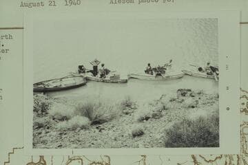 The Nevills sadirons and Aleson's motorboat at a rest stop between Burnt Springs and Emory Falls.  Nevills; Southworth; Doris Nevills; Goldwater; Larabee; West; Deason; Reed; Baker; Cutler; Aleson