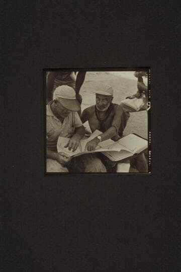 Rod Sanderson is briefed by Marston for the run from Diamond Creek to the head of Lake Mead.  Diamond Creek Camp