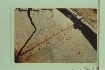 Bottom of metal boat at Cardenas Creek showing joint where fore and aft sections were bolted together