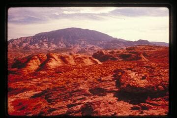 Navajo Mountain from plateau southwest of mouth of Nasja Creek